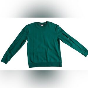 A Zara Teal / green man’s crewneck sweatshirt.